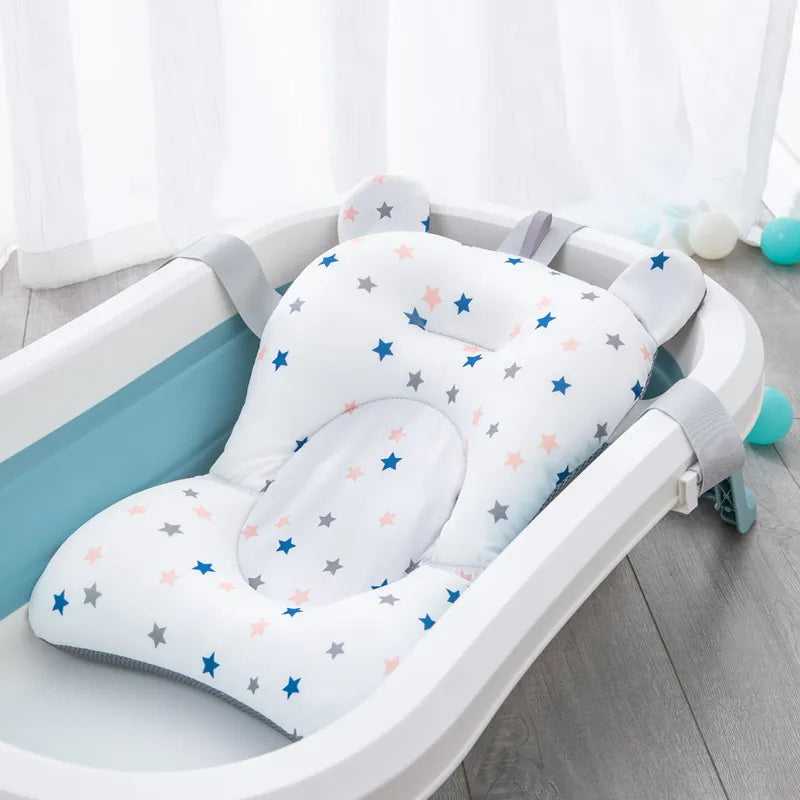 Adorable baby nestled securely in our soft, supportive bath pillow.  Enjoy a safer, more relaxing bath time!