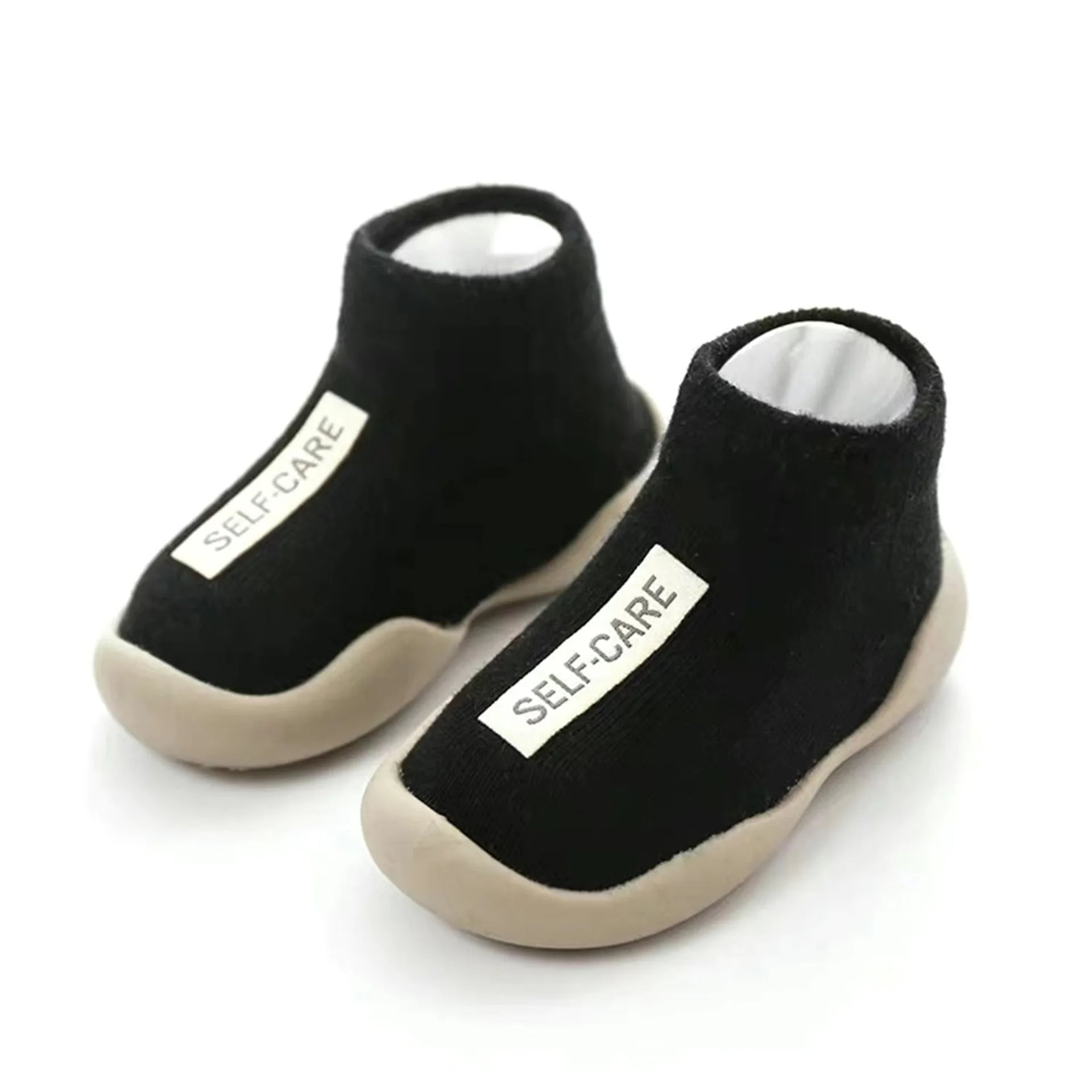 Adorable non-slip baby booties! Soft, safe, and perfect for tiny feet.  Keep your little one steady and stylish.